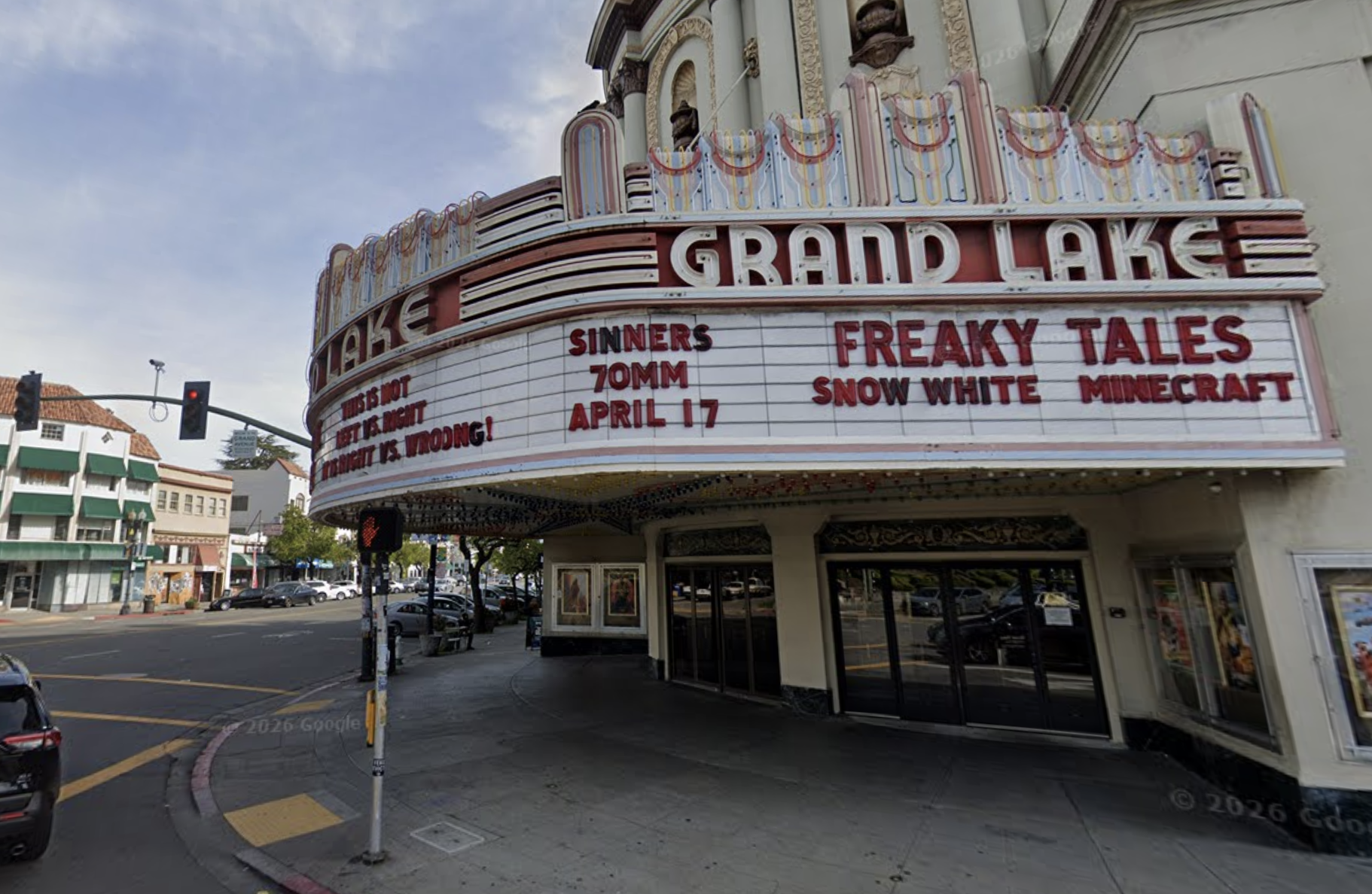 The marquee of Grand Lake Theater, reading "FREAKY TALES" (with "SNOW WHITE" and "MINECRAFT" below it).